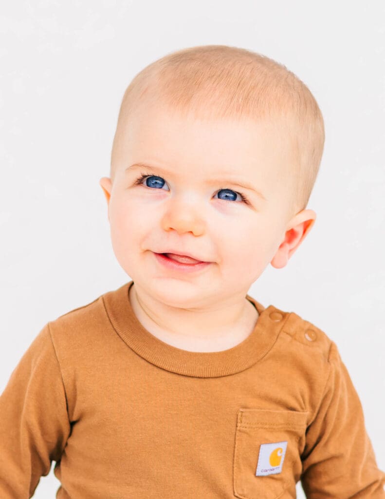 Boy wearing a simple solid color outfit photographed for school picture day in Middle Tennessee by Murfreesboro photographer S. Reed Photography.